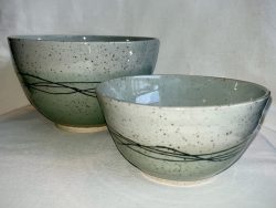 Set of two striped celadon mixing bowls; $95